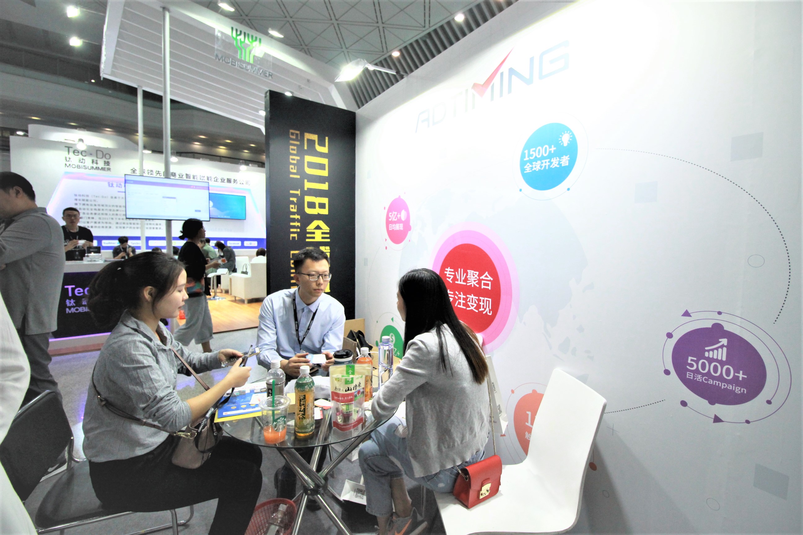 Discussion at the AdTiming Global Traffic Conference Booth